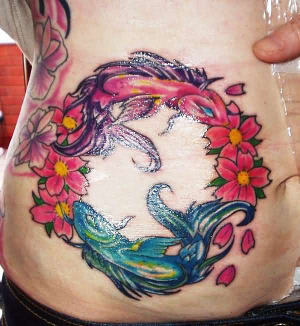Pisces tattoos-flower-tattoos-on-belly