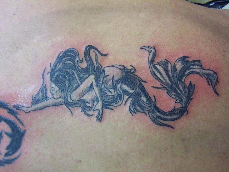 tribal-mermaid-tattoo-design-idea