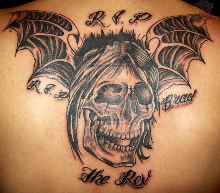 bat-winged-skull-memorial-tattoo