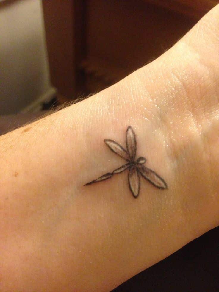 dragonfly tattoo on wrist