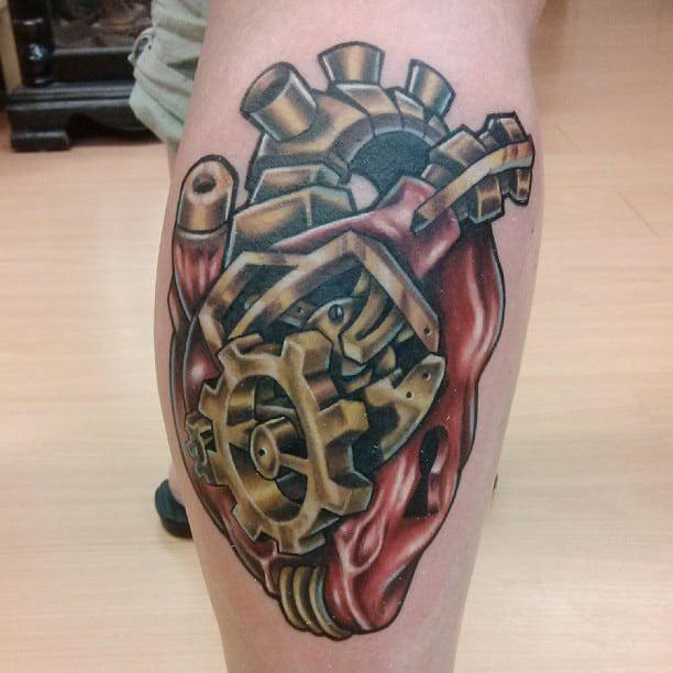 heart-biomechanical-tattoo-on-leg