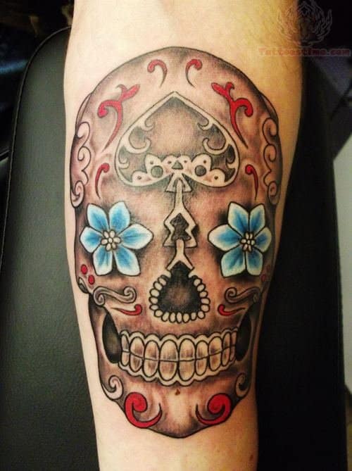 sugar-skull-blue-flower-eyes-tattoo