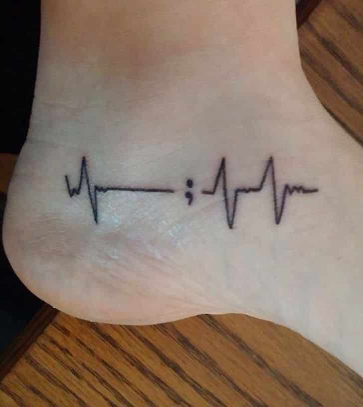 semicolon tatattoo heart beat on foot