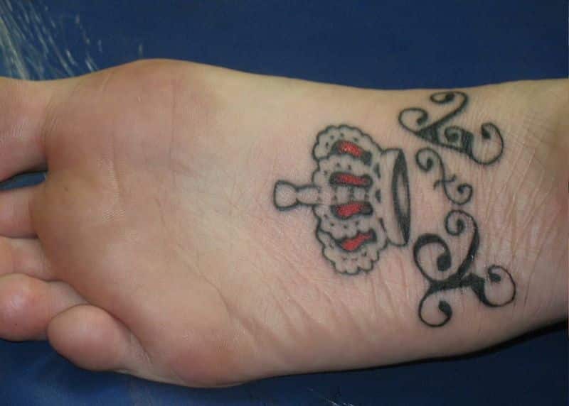 Crown Tattoo Under Feet