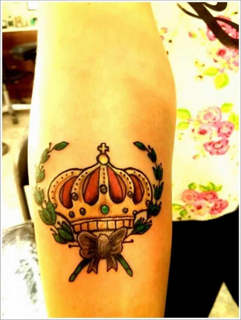 king crown tattoo on arm