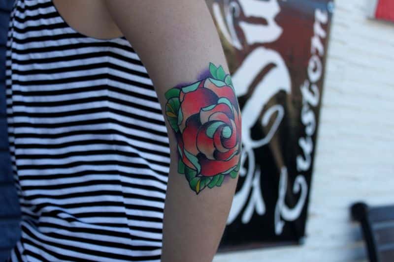 red rose elbow tattoo design for girls