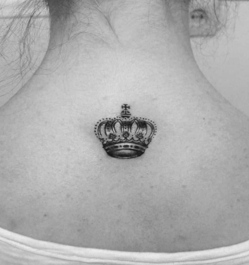 small crown tattoo on neck