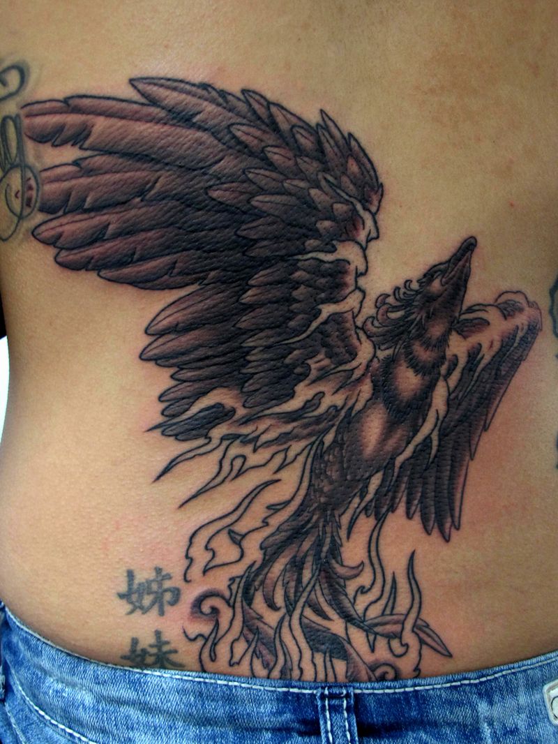 Amazing Phoenix Tattoo On Lower Back