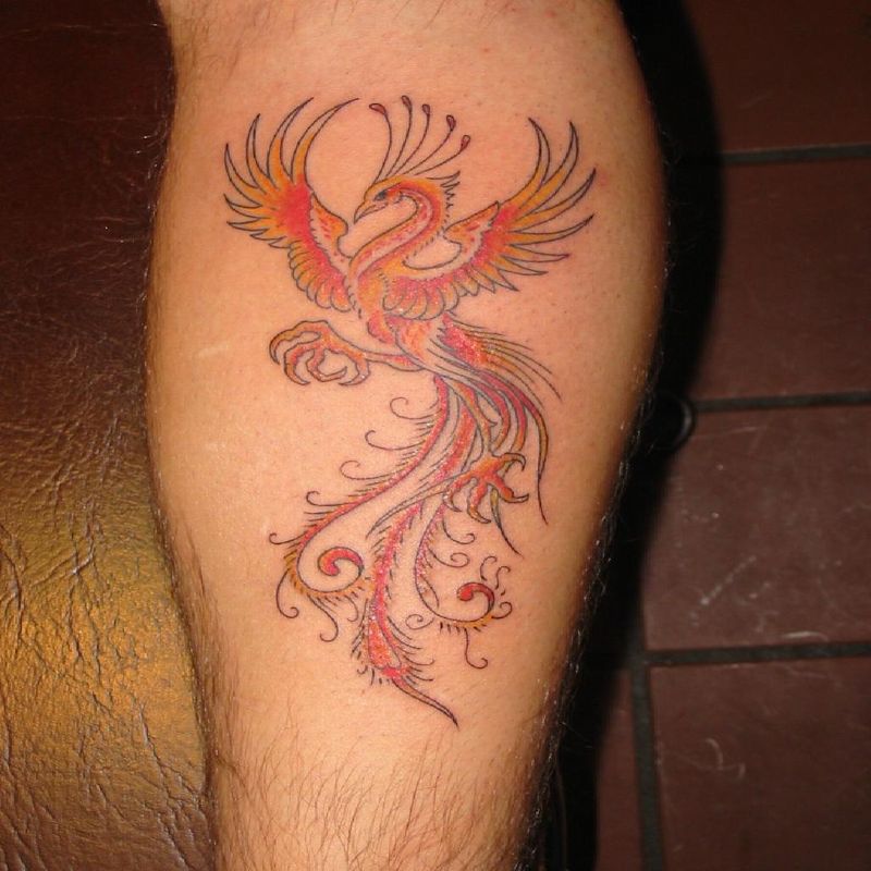 Cute Phoenix Tattoo On Back Leg