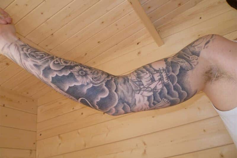 Full Sleeve Cloud And Ship Tattoo Designs For Men