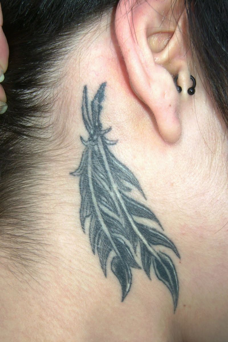 Small Feather Tattoo Behind The Ear