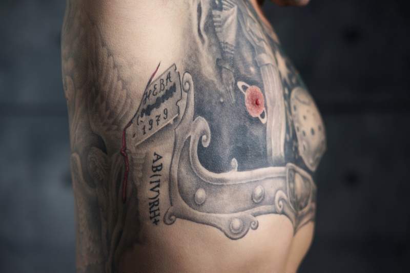 Man with armpit tattoo