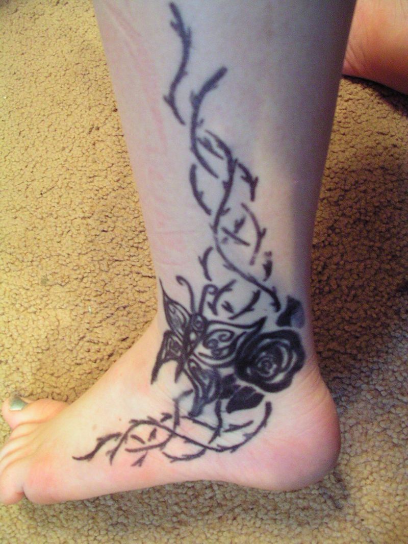 Flower Tattoo On Ankle