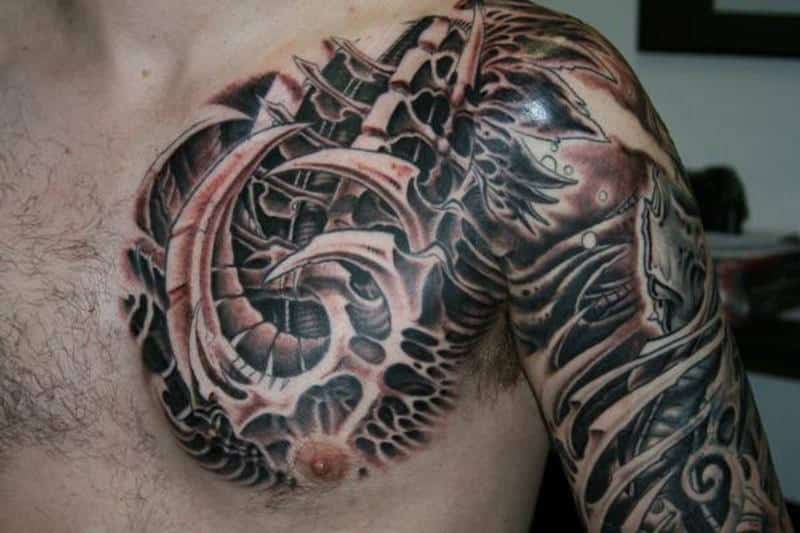 Outstanding Biomechanical Tattoo On Chest
