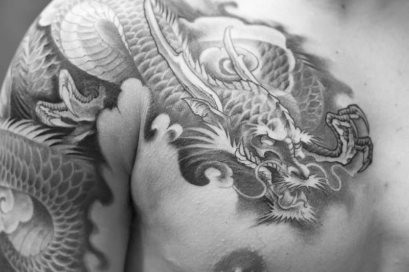 half sleeve asian dragon tattoo design